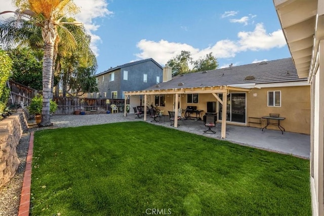 view of yard with a patio and a fenced backyard