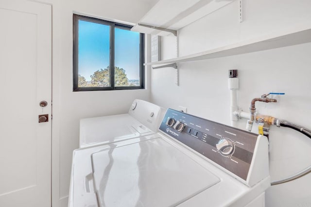 laundry area with laundry area and washer and dryer