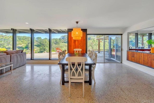 dining area with speckled floor