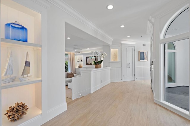 hall with recessed lighting, light wood-style floors, and crown molding