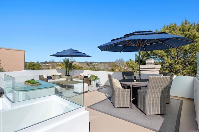 view of patio / terrace with outdoor dining area and outdoor lounge area