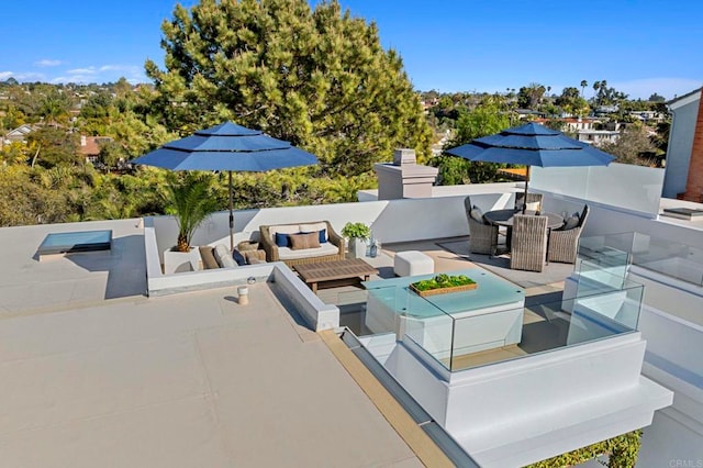 exterior space featuring outdoor dining space and an outdoor living space