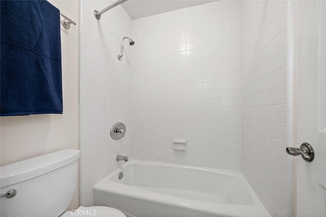 bathroom with toilet and shower / washtub combination