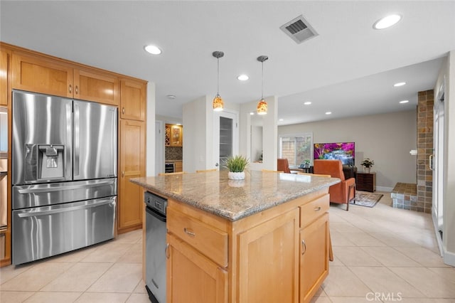 21751 Ontur, Mission Viejo, CA 92692 - kitchen with stainless steel fridge with ice dispenser, light tile patterned flooring, a kitchen island, light stone countertops, and recessed lighting