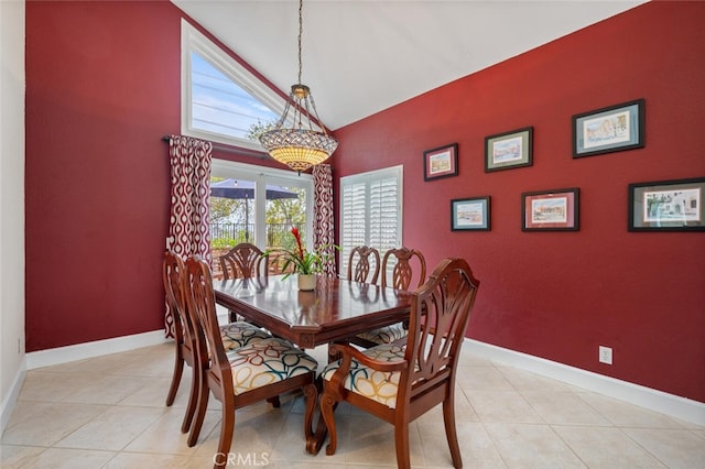21751 Ontur, Mission Viejo, CA 92692 - dining area with baseboards, healthy amount of natural light, light tile patterned floors, and high vaulted ceiling