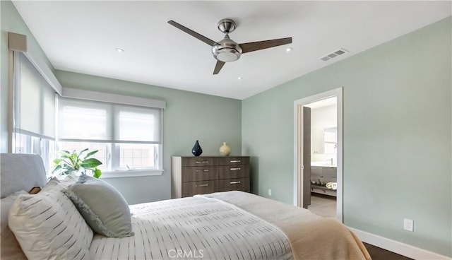 bedroom featuring visible vents, a ceiling fan, ensuite bath, recessed lighting, and baseboards