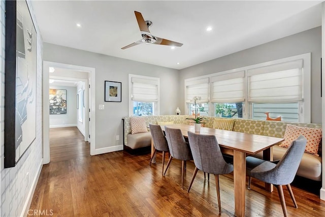 dining space featuring a ceiling fan, recessed lighting, wood finished floors, and baseboards