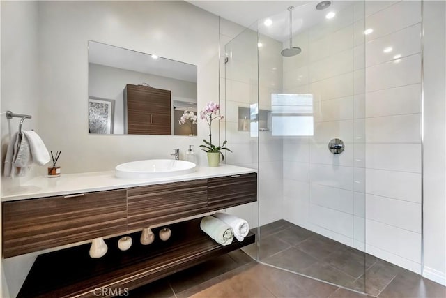 bathroom with vanity and walk in shower