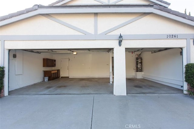 garage featuring driveway