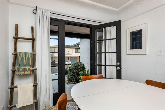 dining room with a textured wall