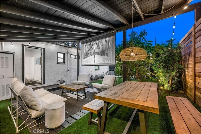 view of patio featuring an outdoor living space and outdoor dining space