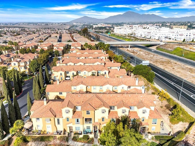 aerial view featuring a mountain view and a residential view