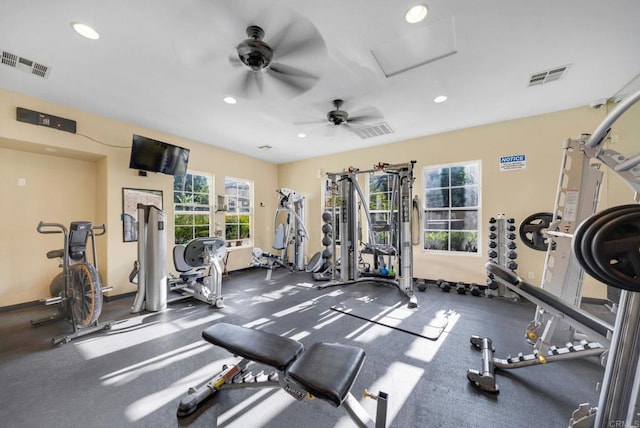 exercise room featuring recessed lighting, visible vents, and attic access