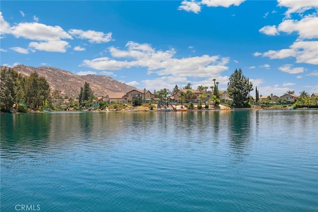 water view with a mountain view and a residential view