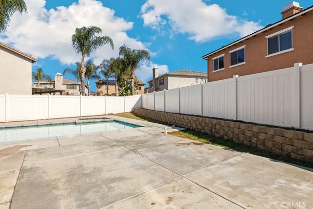 view of pool with a fenced in pool, a patio, and a fenced backyard