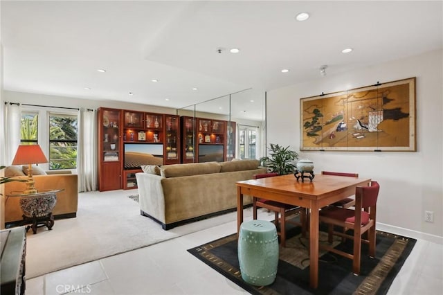 dining area featuring plenty of natural light, recessed lighting, and baseboards