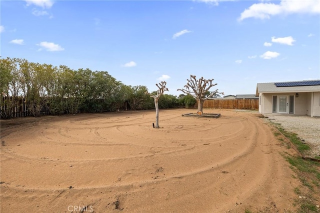 view of yard featuring fence