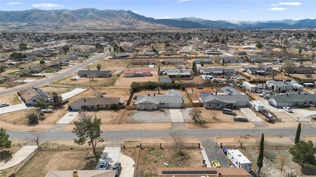 bird's eye view with a residential view and a mountain view