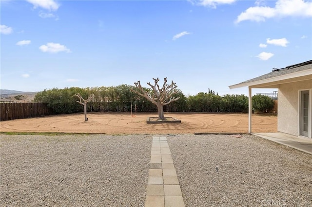 view of yard featuring fence