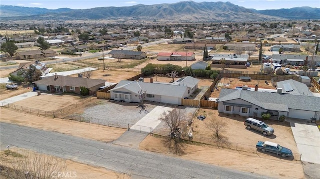 aerial view featuring a mountain view and a residential view