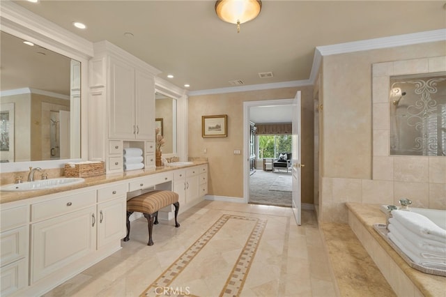 bathroom with a sink, baseboards, and ornamental molding