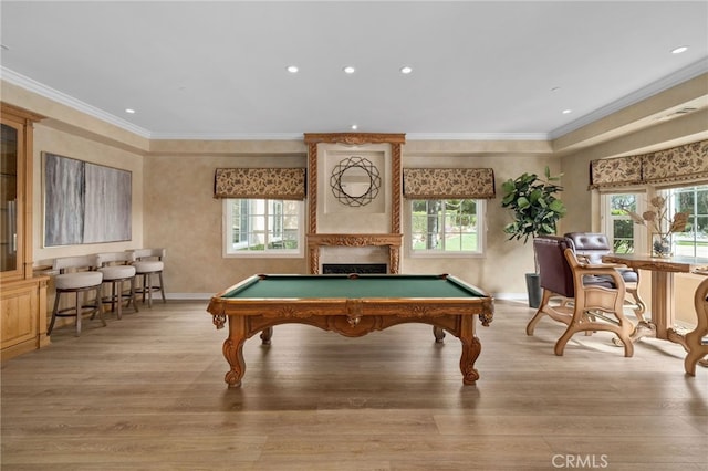 recreation room featuring pool table, plenty of natural light, and light wood-type flooring