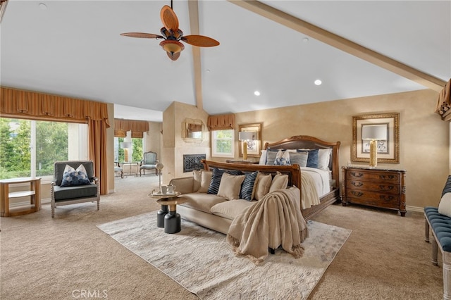 carpeted bedroom with high vaulted ceiling, recessed lighting, baseboards, and a large fireplace