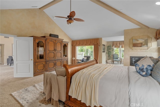 bedroom featuring beamed ceiling, visible vents, high vaulted ceiling, a high end fireplace, and light colored carpet