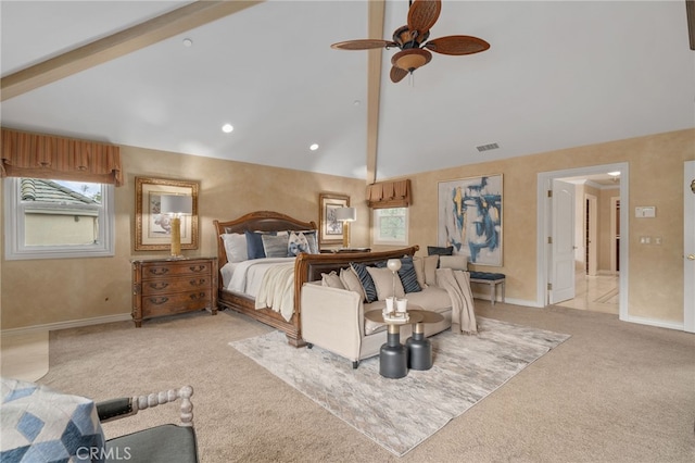 bedroom with multiple windows, beam ceiling, carpet, and baseboards