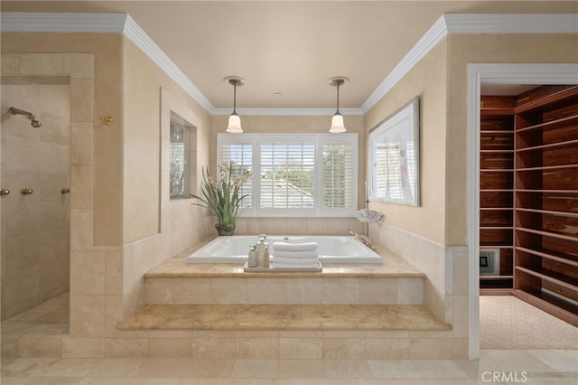 full bathroom with a tile shower, a garden tub, and ornamental molding