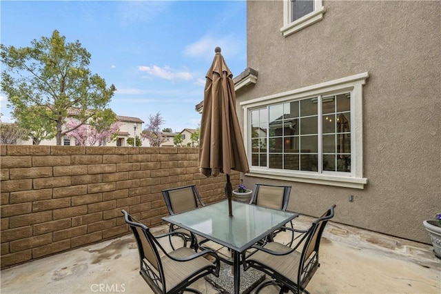 view of patio featuring outdoor dining space