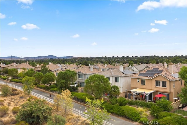 bird's eye view featuring a residential view and a mountain view