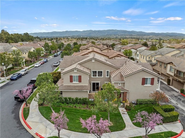 drone / aerial view with a mountain view and a residential view