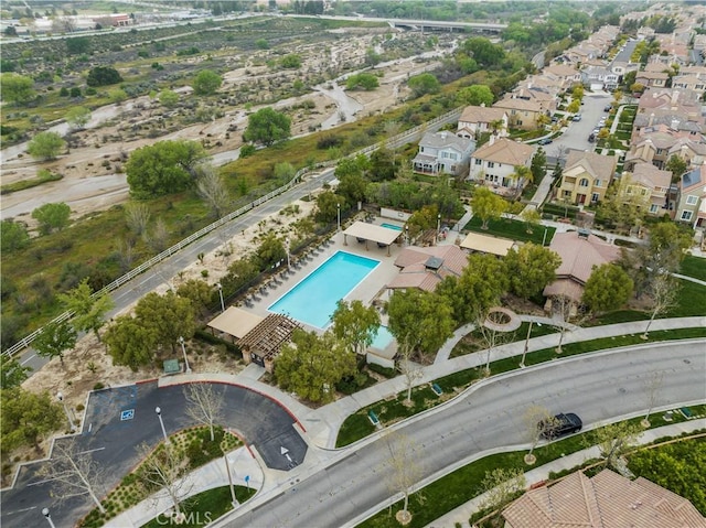 birds eye view of property with a residential view