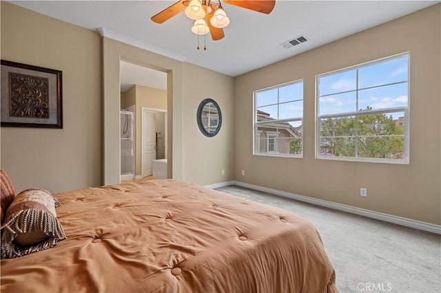 bedroom with multiple windows, baseboards, visible vents, and light carpet