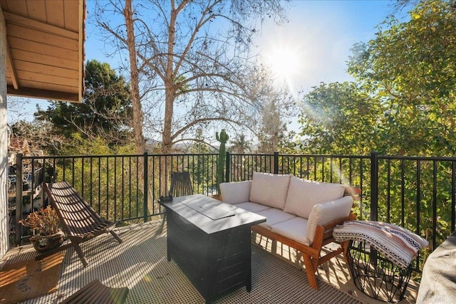 wooden deck with outdoor lounge area