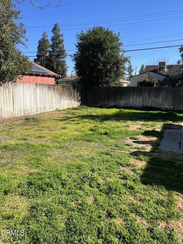 view of yard featuring fence