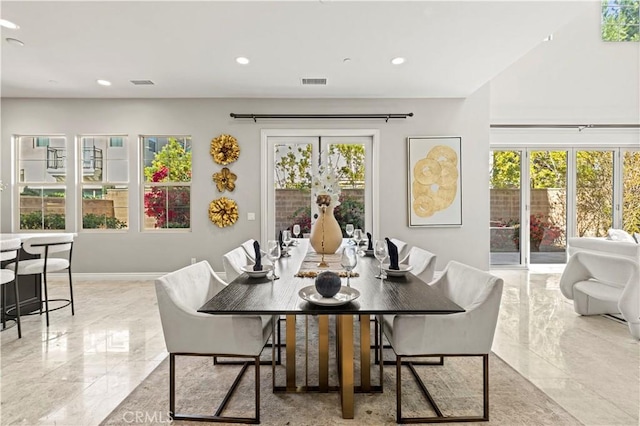 dining area featuring recessed lighting, visible vents, and marble finish floor