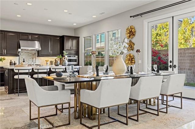 dining room with recessed lighting and visible vents