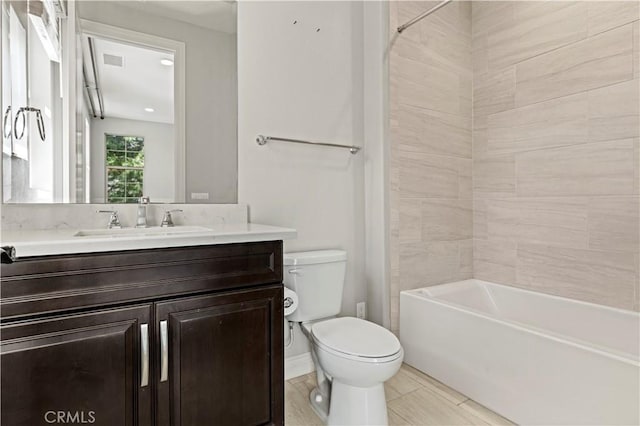 bathroom with vanity,  shower combination, toilet, and visible vents