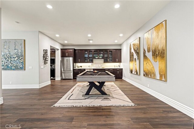 playroom with recessed lighting, baseboards, and dark wood-style floors