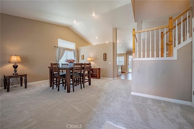 dining area featuring recessed lighting, baseboards, carpet floors, and high vaulted ceiling