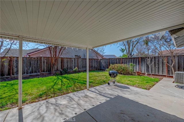 view of patio / terrace with a fenced backyard and central AC