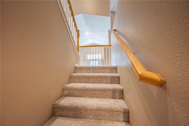 stairs with a textured wall