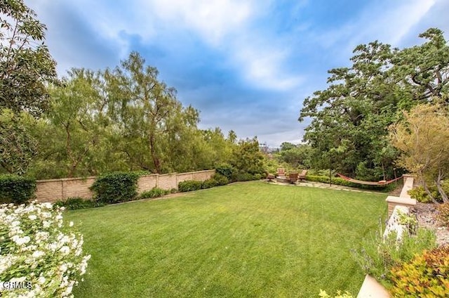 view of yard with fence