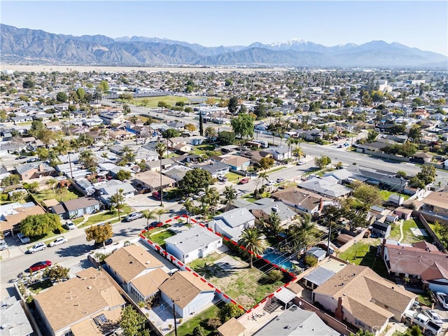 bird's eye view featuring a mountain view and a residential view