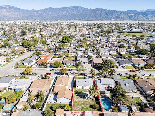 drone / aerial view with a mountain view and a residential view