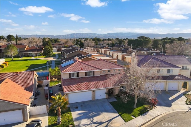 birds eye view of property with a residential view and a mountain view