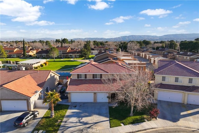 birds eye view of property featuring a residential view and a mountain view