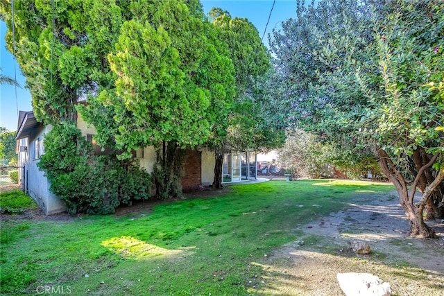 view of yard with fence